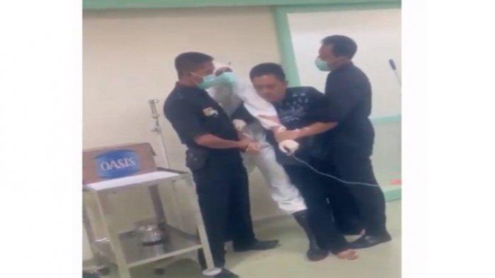 Viral, Pasien Covid-19 Ngamuk, APD Petugas Medis Sampai Robek saat Mengamankannya