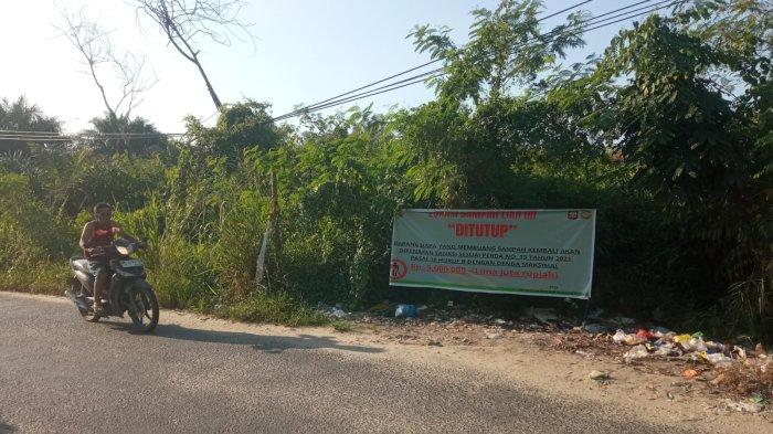 FOTO: TPS Liar di Pekanbaru Dipasang Spanduk Sanksi Berat Bagi Pembuang Sampah Sembarangan - spanduk-tentang-larangan-membuang-sampah-di-Pekanbaru.jpg