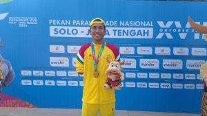 Budi-Setiyo-berhasil-meraih-emas-perdana-di-ajang-Peparnas-2024.jpg