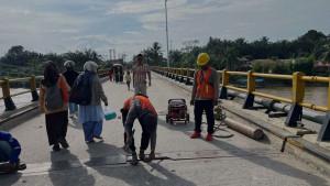 Jembatan-Ujung-Batu-di-Kecamatan-Ujung-Batu-Kabupaten-Rokan-Hulu.jpg