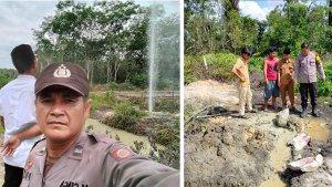 Personel-Polsek-Kerumutan-mengecek-lokasi-semburan-air.jpg
