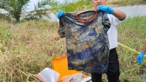 Personel-Satreskrim-Polres-Pelalawan-dan-Polsubsektor-Pelalawan-mengevakuasi-tulang-manusia.jpg