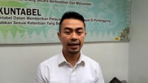 eks-pj-wako-pekanbaru-risnadar-mahiwa-usai-sidang-vonis.jpg