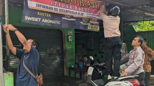 spanduk-bakso-mengandung-babi.jpg