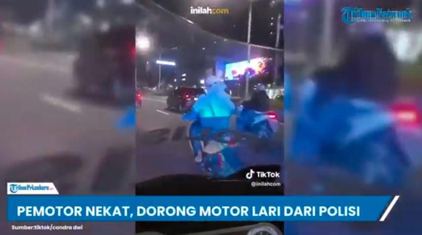 Seorang-pengendara-motor-berusaha-kabur-dari-Polisi-saat-melanggar-lalu-lintas.jpg