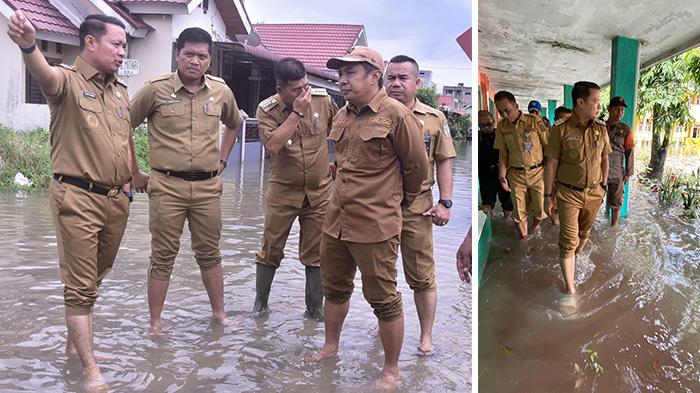 Wabup-Pelalawan-H-Husni-Tamrin-meninjau-beberapa-titik-banjir.jpg