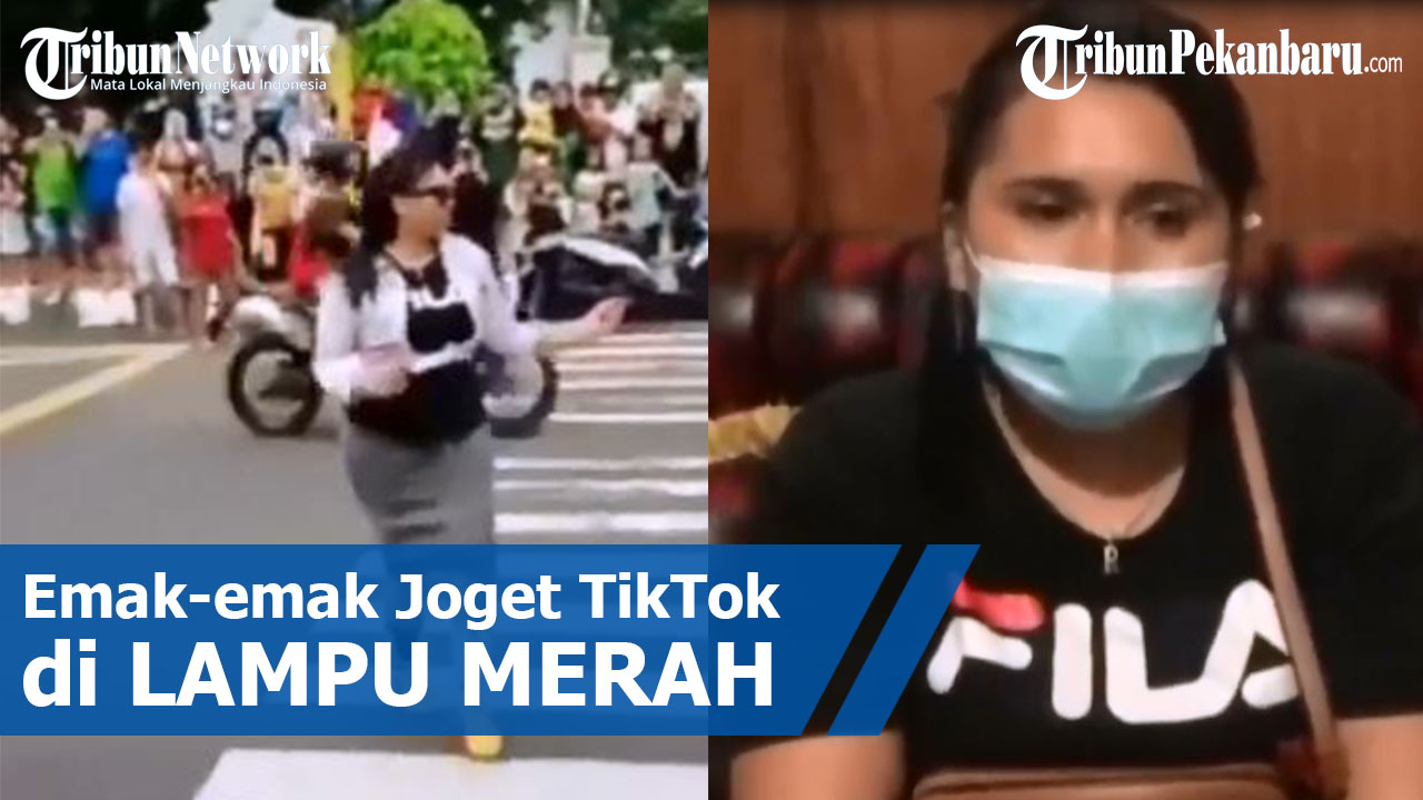 emak-emak-berseragam-anak-sekolah-tiktok-di-lampu-merah.jpg