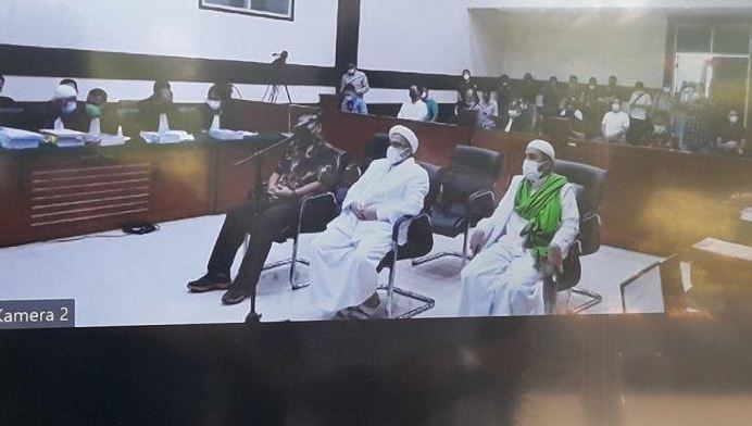 muhammad-rizieq-shihab-di-pn-jakarta-timur-rabu-2142021.jpg