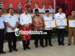 22-instansi-di-riau-masuk-kawasan-sadar-hukum-diresmikan-menkum-ham-ri-dalam-kunjungan-ke-riau.jpg