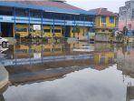 Banjir-menggenangi-sebuah-sekolah-di-Kabupaten-Rokan-Hilir.jpg