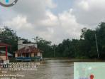 Banjir-yang-melanda-Desa-Lubuk-Kembang-Bunga-Ukui-meluas.jpg