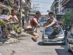 Dari-kiri-Tiger-Hu-Chen-Tony-Jaa-dan-Iko-Uwais-dalam-film-Triple-Threat.jpg
