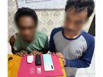 Dua-tersangka-dari-Tualang-yang-diamankan-Polres-Siak.jpg