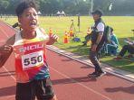 Ekspresi-atlet-difabel-atletik-Riau-Tiwa-usai-meraih-emas-di-Peparnas-2024.jpg