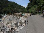 FOTO_Kondisi_Terkini_Jalan_Putus_di_Lembah_Anai_Pasca_Banjir_Bandang_Sumbar_8.jpg