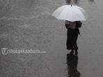 Ilustrasi-hujan-pakai-payung-di-Pekanbaru.jpg