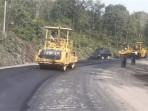 Jalan-lintas-Pekanbaru-Kuansing-yang-merupakan-jalan-nasional-mulai-diperbaiki.jpg