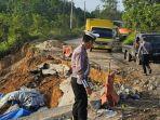 Jalur_Lintas_Riau-Sumbar_Akan_Ditutup_Total_Sementara_di_Titik_Jalan_Amblas_Saat_Perbaikan.jpg