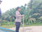 Kapolres-Kuansing-AKBP-R-Ricky-Pratidiningrat-mencoba-menenangkan.jpg