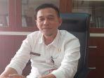 Kepala-Dinas-DP2KBP3A-Kuansing-Aswandi.jpg