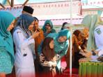 Ketua-TP-PKK-Rohul-program-pemeriksaan-kesehatan-gratis-di-sekolah.jpg