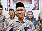Ketua_KPU_Inhil_Herdian_Asmi_bersama_para_komisioner_KPU_Inhil.jpg