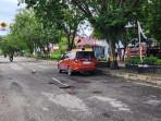 Lubang_menganga_terlihat_di_Jalan_Patimura_Dumai.jpg