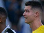 MOmen-Cristiano-Ronaldo-menangis.jpg