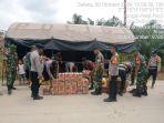 Polsek-Kubu-Kabupaten-Rokan-Hilir-membuat-tenda-pengungsian-untuk-korban-banjir.jpg