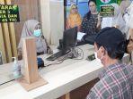 Satu-warga-mengakses-layanan-Pemeriksaan-Kesehatan-Gratis-PKG.jpg