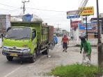 Truk-operator-angkutan-sampah-terlihat-di-Jalan-Delima-Kota-Pekanbaru.jpg