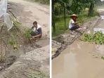 Viral-video-warga-memancing-dan-menanam-sawit-di-jalan-rusak-di-Kabupaten-Kampar.jpg