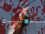 aksi-damai-mahasiswa-peringatan-hari-aids-2-06122015_20151206_111836.jpg