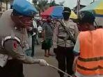 anggota-polda-maluku-menggelar-razia-penertiban-warga-yang-tidak-mengenakan-masker.jpg