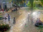 banjir-merendam-akses-jalan-warga-di-indragiri-hulu.jpg