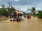 banjir-simpang-kumu-rohul.jpg
