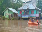 banjir-yang-terjadi-di-desa-lubuk-kembang-bunga-kecamatan-ukui.jpg