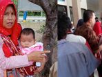 belum-sarapan-dan-anak-sakit-kisah-haru-mahliana-emak-emak-yang-histeris_20180920_115147.jpg