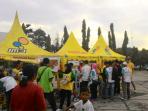 booth-indosat-di-acara-jalan-sehat-tribun-26042015_20150426_120133.jpg