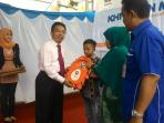 bri-riau-serahkan-bantuan_20151223_150510.jpg