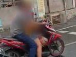 capture-video-viral-pengendara-motor-melakukan-tindak-asusila-di-tengah-jalan.jpg