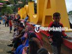danau-raja-objek-wisata-populer-di-inhu-riau-saat-libur-lebaran-2019-ada-taman-bunga-marigold.jpg