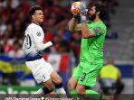 dele-alli-vs-alisson-becker.jpg