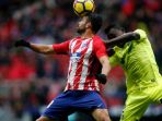 diego-costa-berebut-bola-dengan-dakonam-djene-saat-atletico-madrid-menjamu-getafe_20180107_073832.jpg