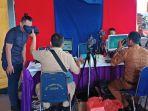 disdukcapil_pekanbaru_buka_pelayanan_di_stadion_rumbai_sehari_rekam_218_warga.jpg