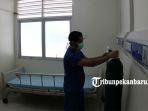foto-penampakan-ruangan-isolasi-untuk-pasien-virus-corona-di-rsud-arifin-achmad-riau-2.jpg