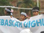 foto_aksi_solidaritas_untuk_muslim_uighur_di_pekanbaru_1.jpg<pf>foto_aksi_solidaritas_untuk_muslim_uighur_di_pekanbaru_2jpg.jpg<pf>foto_aksi_solidaritas_untuk_muslim_uighur_di_pekanbaru_3.jpg<pf>foto_aksi_solidaritas_untuk_muslim_uighur_di_pekanbaru_4.jpg<pf>foto_aksi_solidaritas_untuk_muslim_uighur_di_pekanbaru_5.jpg<pf>foto_aksi_solidaritas_untuk_muslim_uighur_di_pekanbaru_6.jpg