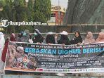 foto_aksi_solidaritas_untuk_muslim_uighur_di_pekanbaru_4.jpg