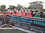 foto_aksi_solidaritas_untuk_muslim_uighur_di_pekanbaru_5.jpg