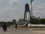 foto_jalan_akses_menuju_jembatan_siak_iv_sudah_mulus_2.jpg